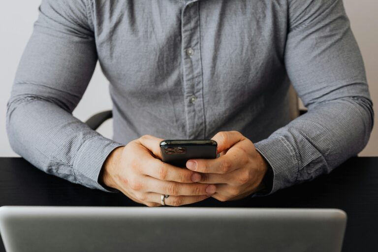 Person using mobile phone to order medicine
