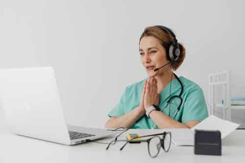 Doctor conducting a telehealth consultation with a patient via video call