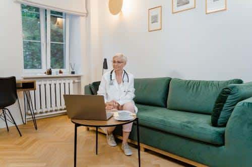 Doctor conducting a virtual medical consultation with a patient.
